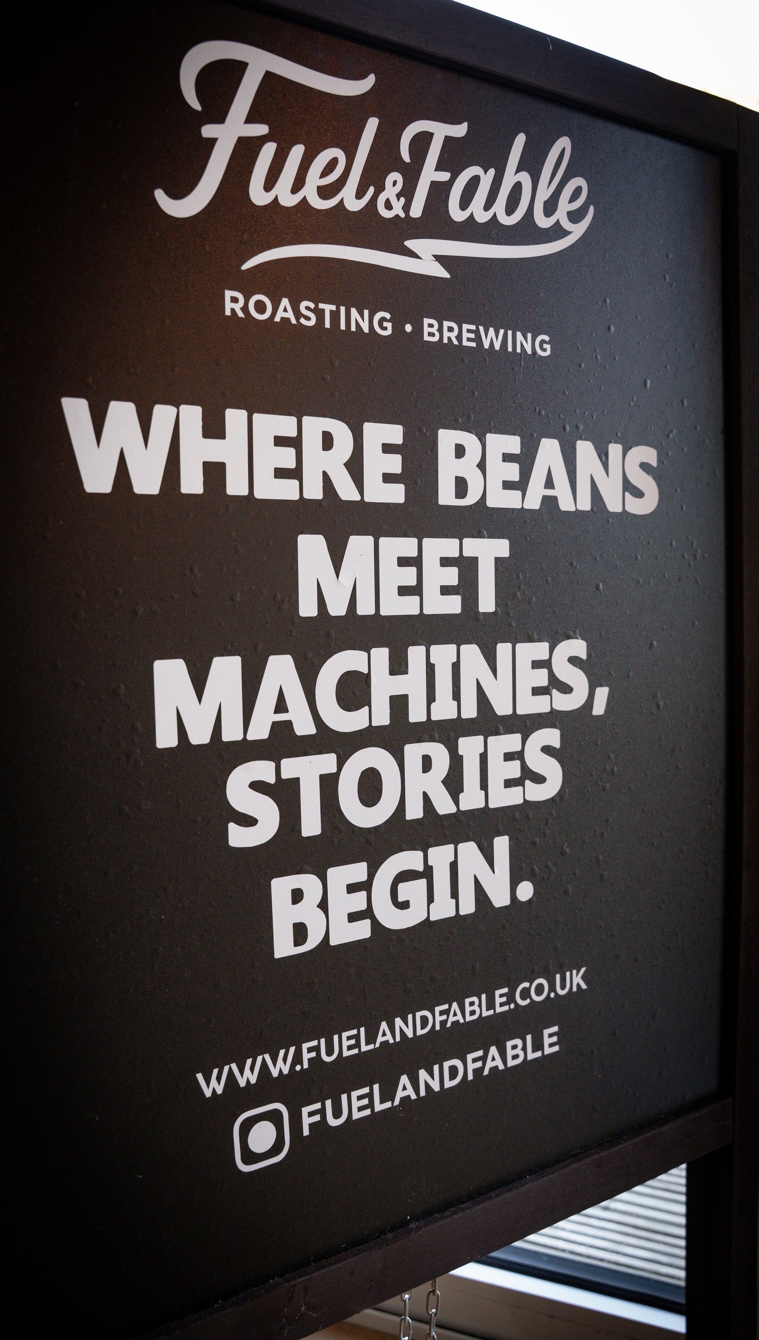 Advertisement for Fuel & Fable with text 'Where beans meet machines, stories begin.'